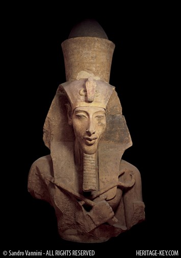 Colossal Statue of Amenhotep IV / Akhenaten. Numerous colossal sandstone images of Amenhotep IV enhanced the colonnade of the king&rsquo;s temple to the Aten at East Karnak. The double crown, atop the nemes-headdress, alludes to the living king as representative of the sun god. Image Copyright - Sandro Vannini.