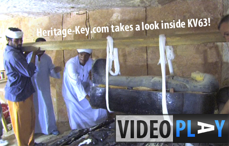 Archaeologists moving one of the sarcophagi inside KV63. Click the image to skip to the video.