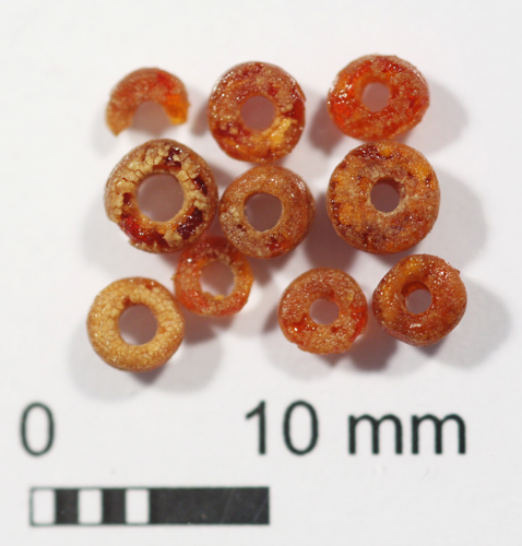 Amber Beads, found at the 'Boy with the Amber Necklace' burial site at Boscombe. - Image BGS (copyright) NERC