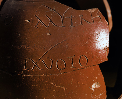 Detail of the dedication to the god Mithra on a Dechelette 72 vase, manufactured at Lezoux. - Image Copyright Herv Paitier INRAP