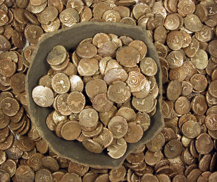 The Iron Age gold coins discovered at Wickham Market, and their container. - Image courtesy of Suffolk Archaeological Unit