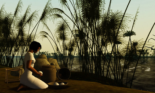 Servant girl kneeling by the Nile
